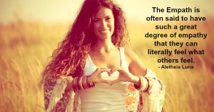 smiling young woman in summer field show heart shape hands sign